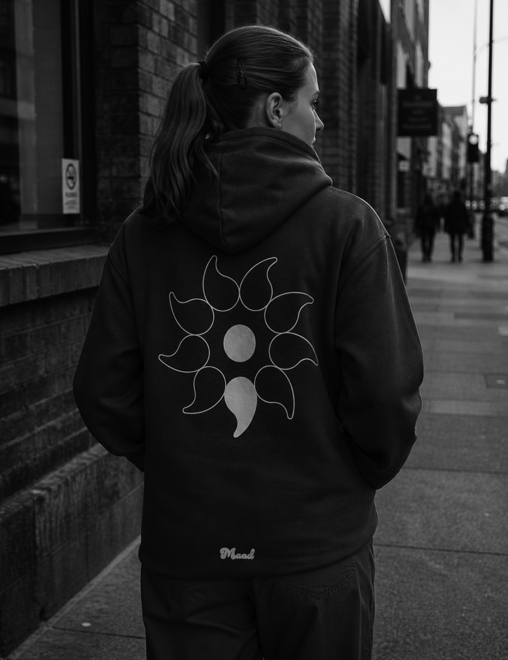 Model wearing MAAD Peace Hoody